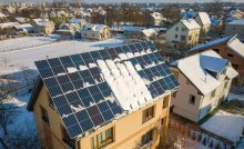 solar panels in winter that have snow on them